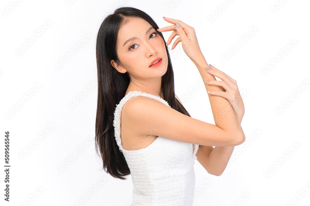 Portrait of young beautiful sexy asian woman wearing a white dress pose with empty space. Portrait of young beautiful sexy asian woman wearing a white dress pose with empty space.