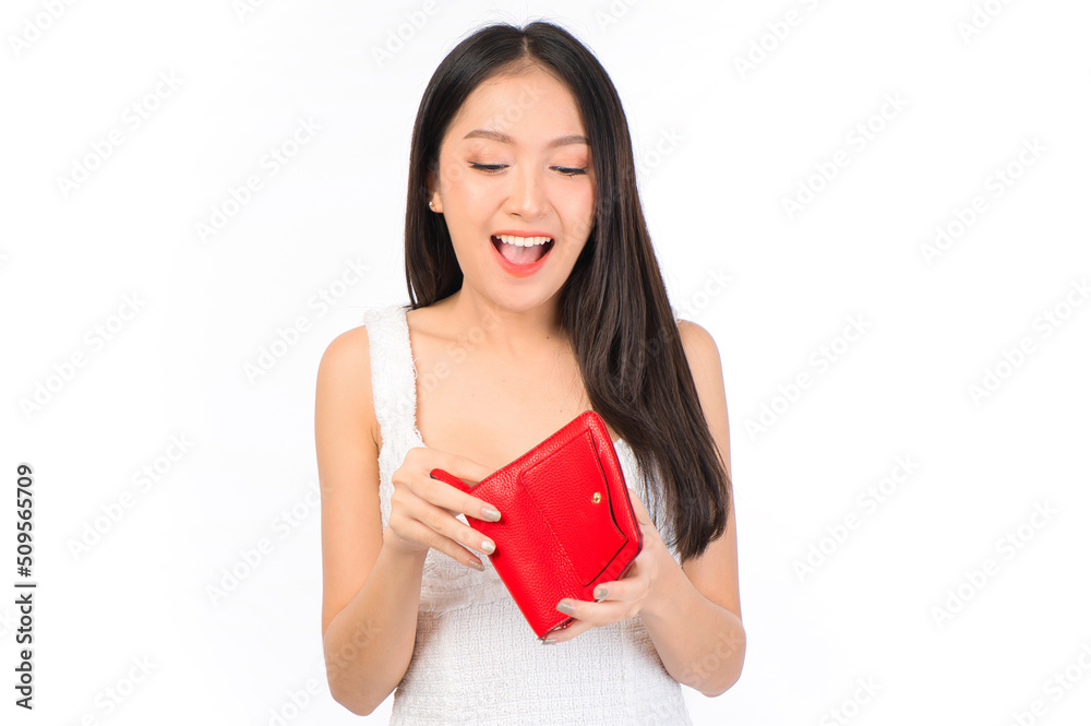Portrait of young cheerful sexy asian woman happy holding happy holding a purse and wallet in hand, winner successful in business bankruptcy economic financial concept. Portrait of young cheerful sexy asian woman happy holding happy holding a purse and wallet in hand, winner successful in business bankruptcy economic financial concept.