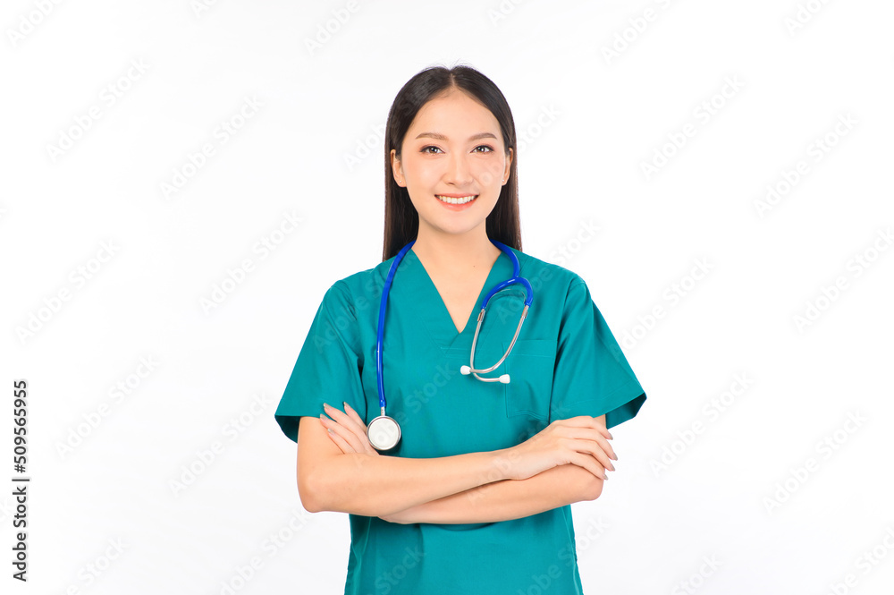 Portrait of professional confident young asian female smiling doctor in green scrubs doctor healthcare and doctors concept. Portrait of professional confident young asian female smiling doctor in green scrubs doctor healthcare and doctors concept.