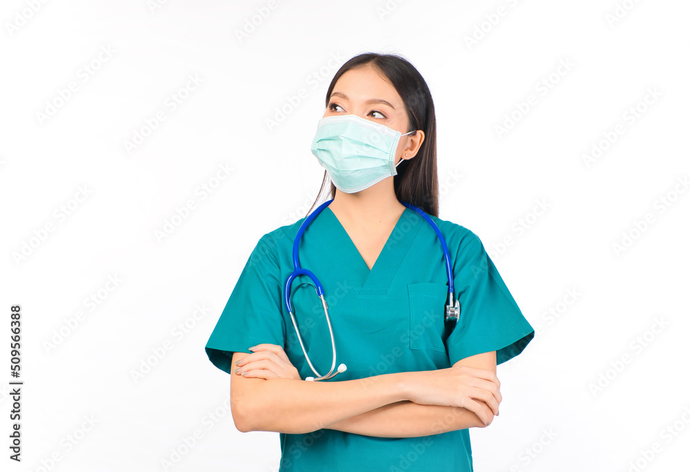 Portrait of professional confident young asian female smiling doctor in green scrubs doctor healthcare and doctors concept. Portrait of professional confident young asian female smiling doctor in green scrubs doctor healthcare and doctors concept.