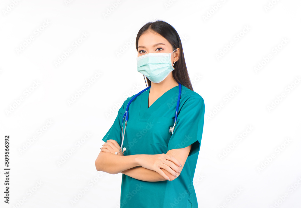 Portrait of professional confident young asian female smiling doctor in green scrubs doctor healthcare and doctors concept. Portrait of professional confident young asian female smiling doctor in green scrubs doctor healthcare and doctors concept.