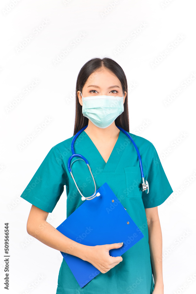 Portrait of professional confident young asian female smiling doctor in green scrubs holding clipboard, protection flu cold facial mask Self-isolation, social distancing. Portrait of professional confident young asian female smiling doctor in green scrubs holding clipboard, protection flu cold facial mask Self-isolation, social distancing.