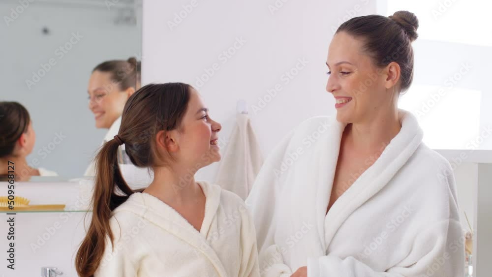 beauty, hygiene and people concept - happy smiling mother and daughter hugging in bathroom beauty, hygiene and people concept - happy smiling mother and daughter hugging in bathroom