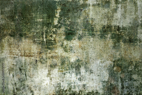 Abstract grungy white wall background with green patches