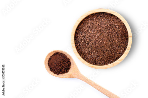 Instant coffee in wooden bowl and spoon isolated on white