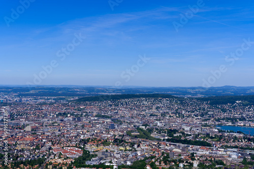 Aerial view of City of Z  rich and Lake Z  rich seen from local mountain Uetliberg on a sunny spring day. Photo taken May 18th  2022  Zurich  Switzerland.