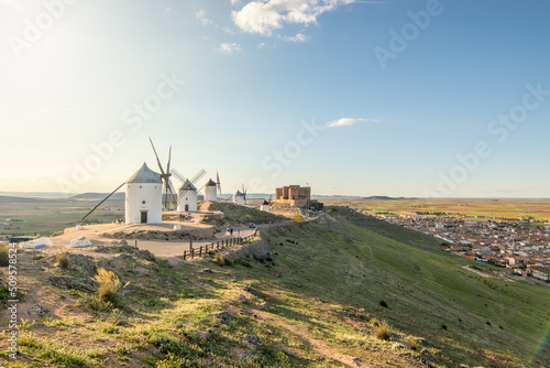 Windmills of Consuegra in the province of Toledo during a sunset with a clear summer day