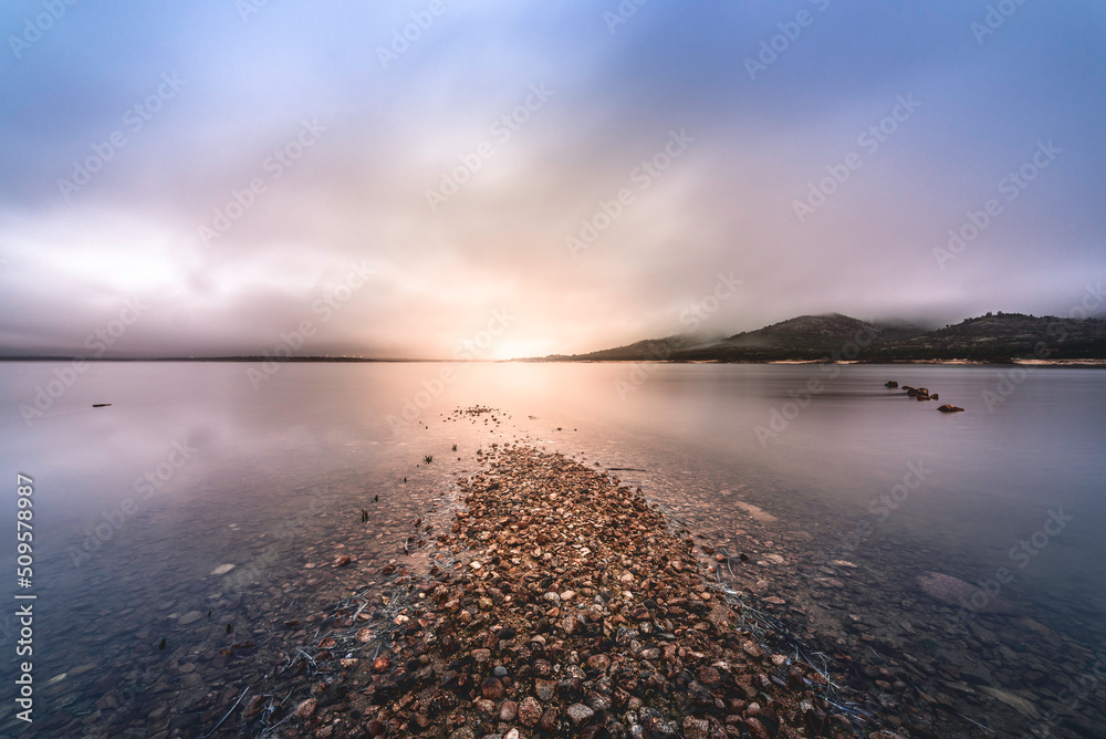 Fototapeta premium Winter sunrise at Manzanares el Real (Madrid), Santillana Reservoir