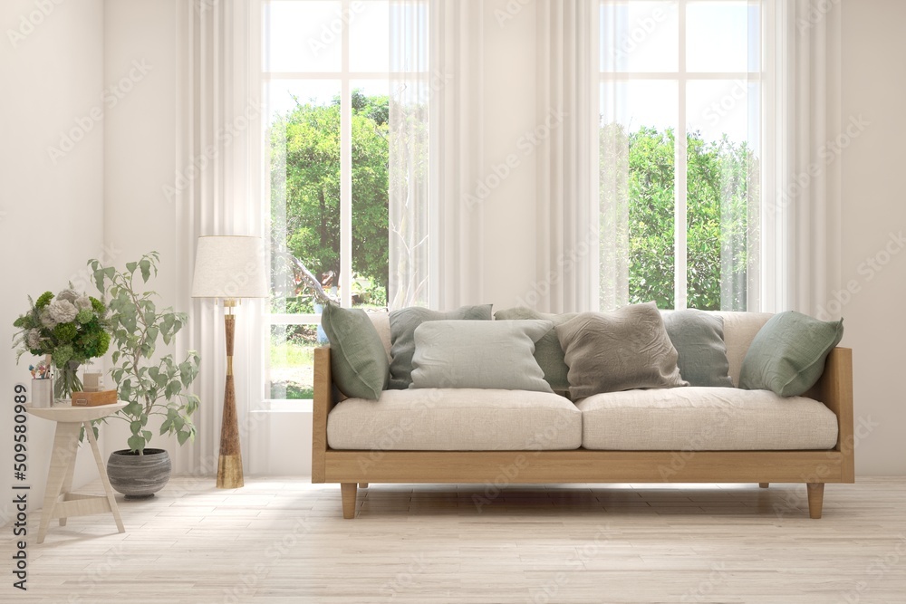 Fototapeta premium Minimalist living room in white color with sofa and summer landscape in window. Scandinavian interior design. 3D illustration