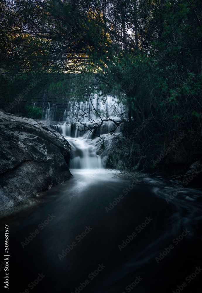 Fototapeta premium Waterfall in the Jobalo stream, El Berrueco, Madrid