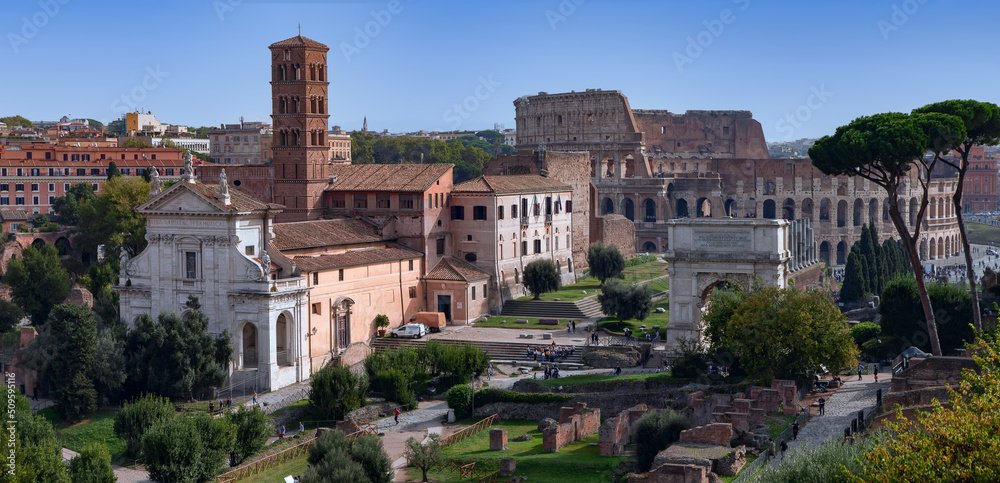 View of the Basilica Santa Francesca Romana, Arch of Constantine, Colosseum. Rome, Italy. View from Palatine Hill.