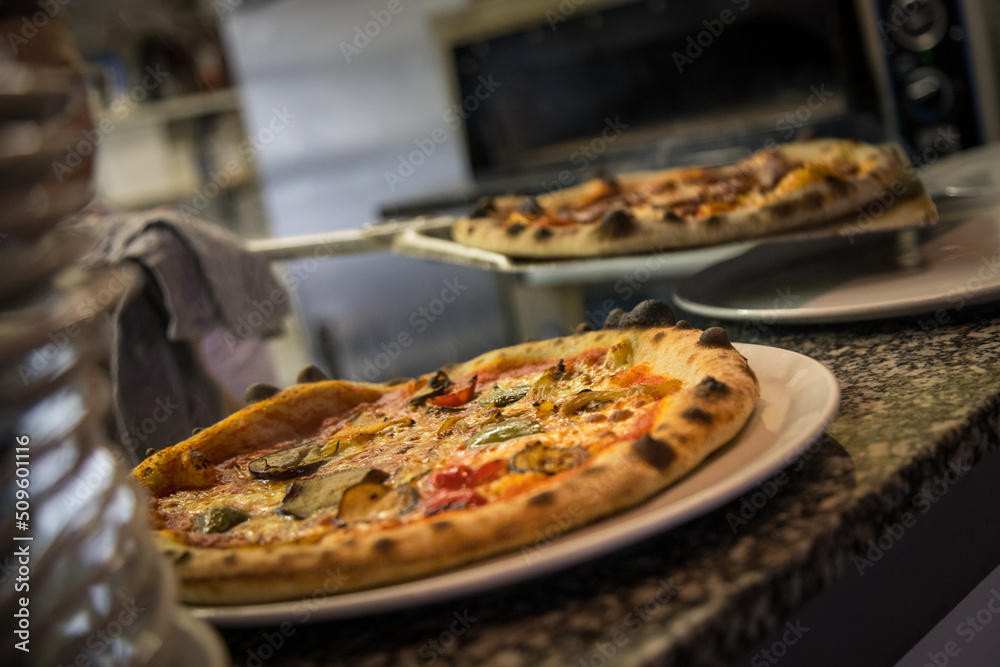 Roasted vegetable cheese and pepperoni pizza