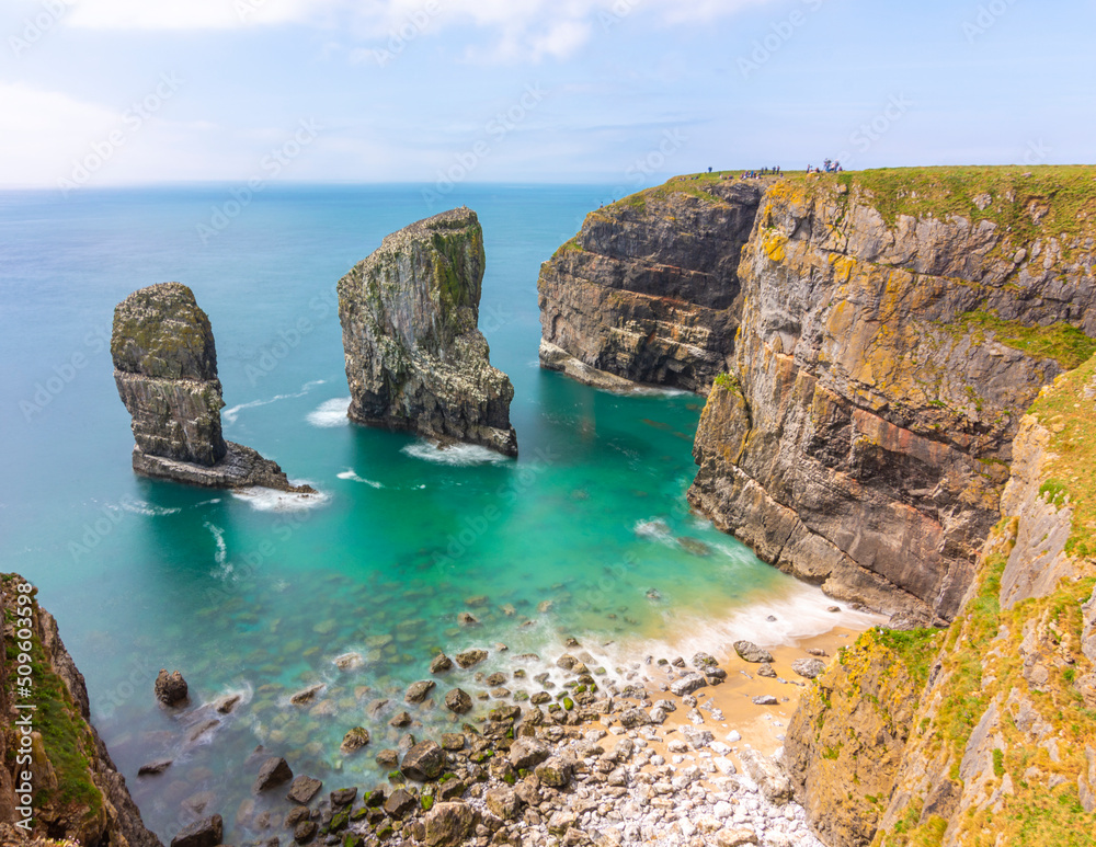 Landscape view of Stack Rocks on a sunny day - Pembrokeshire, Wales, UK