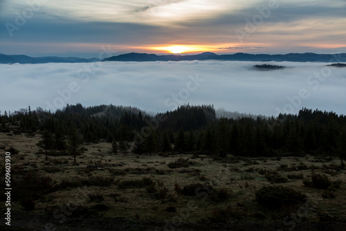 Forests and valleys in the clouds during sunrise in the mountains, Carpathians, Smotrych © almostfuture
