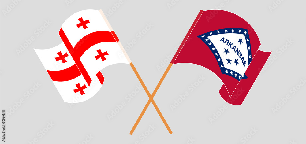 Crossed and waving flags of Georgia and The State of Arkansas Crossed and waving flags of Georgia and The State of Arkansas