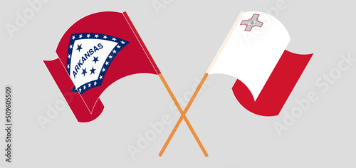Crossed and waving flags of The State of Arkansas and Malta