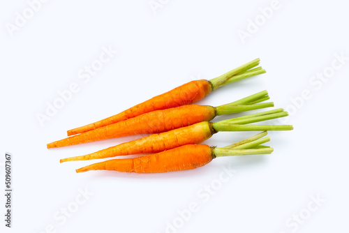 Fresh carrots on white background.