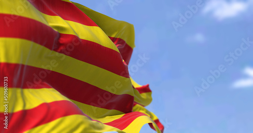 Catalan flag waving in the wind on a clear day photo