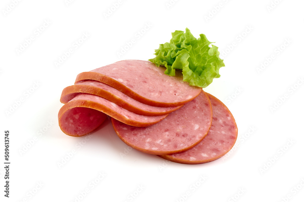 Salami sausage slices with lettuce leaf, isolated on white background.
