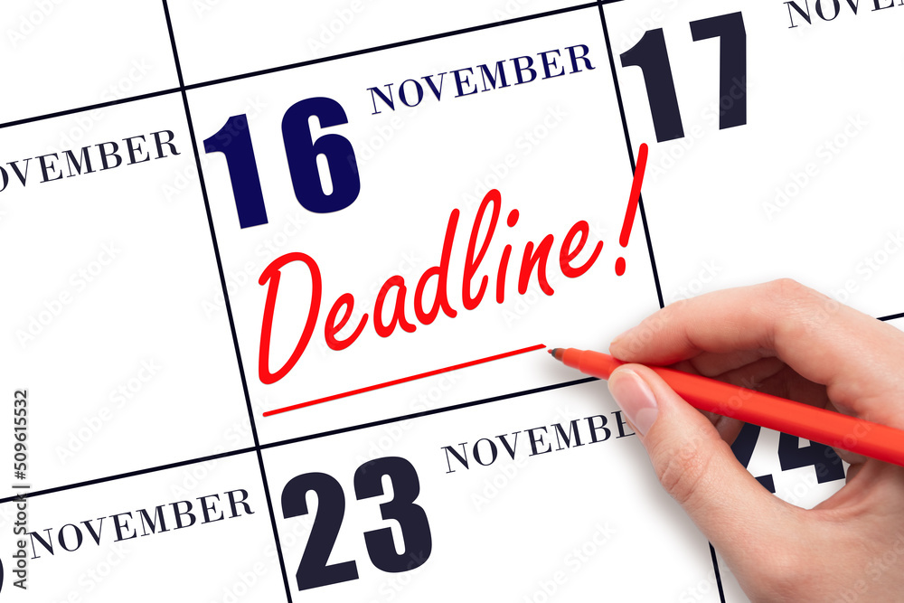 Hand drawing red line and writing the text Deadline on calendar date November 16. Deadline word written on calendar Hand drawing red line and writing the text Deadline on calendar date November 16. Deadline word written on calendar