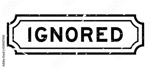 Grunge black ignored word rubber seal stamp on white background