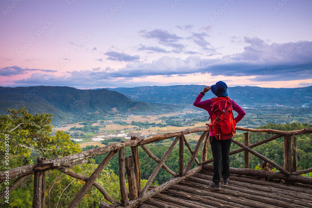 Young women hiking on high mountain, Phong-fan, Loei province Thailand. Young women hiking on high mountain, Phong-fan, Loei province Thailand.