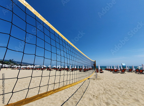Volleyball net on the beach in the sea resort