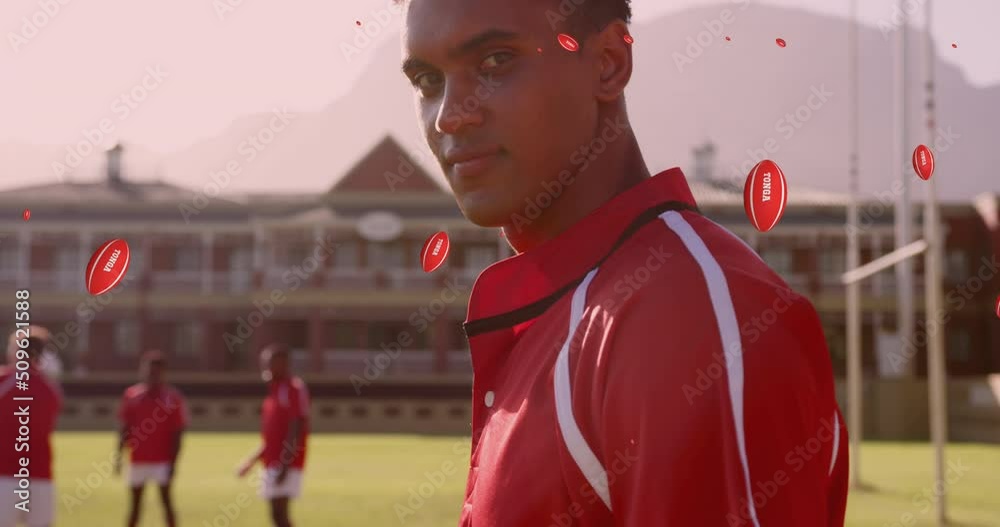 Animation of diverse male rugby player with rugby balls with tonga texts over stadium