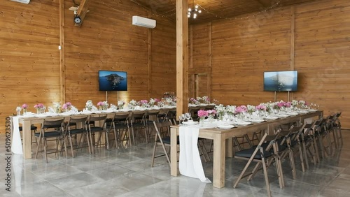 Decor of flowers on the table in pink and white tones. Decorations on the table