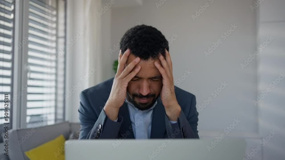 Depressed businessman man counting euro money working on computer at office desk, inflation concept. Depressed businessman man counting euro money working on computer at office desk, inflation concept.