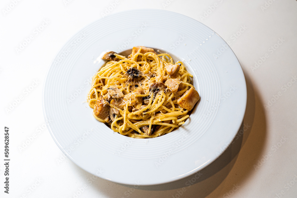 Pasta food in a plate on a white background