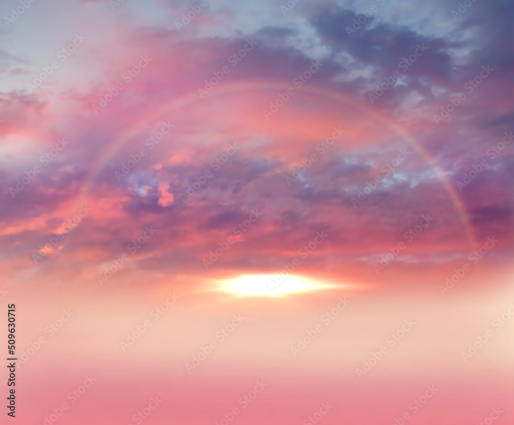pink  lilac orange sunset and blue cloudy  sun beam sky with rainbow nature landscape