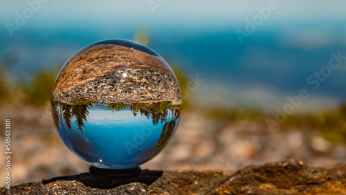 Crystal ball landscape shot at the famous Hohenbogen summit, Bavarian forest, Bavaria, Germany