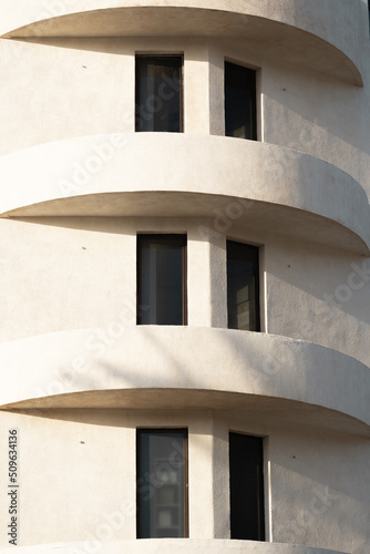 one white facade with windows