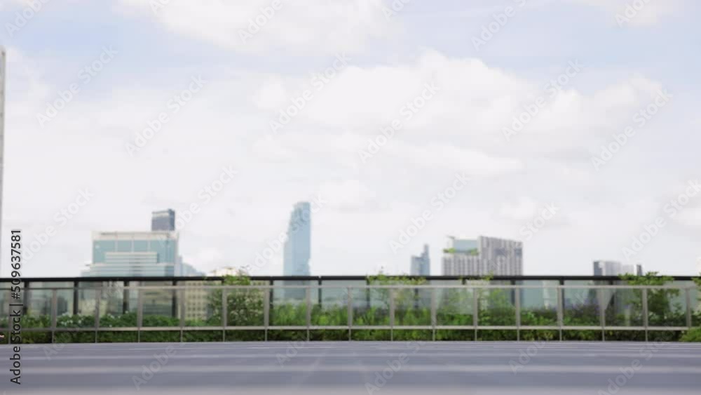 Asian businesswoman in black suit walking at Modern high rise building before work in morning. Attractive business girl. Career people. Slow motion Asian businesswoman in black suit walking at Modern high rise building before work in morning. Attractive business girl. Career people. Slow motion