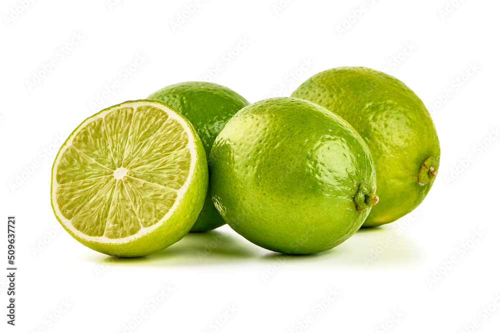 Green lime with cut in half, isolated on white background. Green lime with cut in half, isolated on white background.