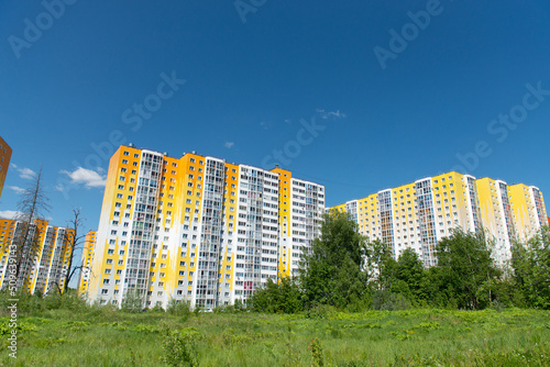 view of the residential complex from a clear field