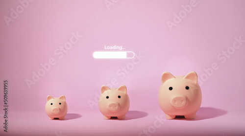 Piggy bank isolated on pink background. Saving money concept.