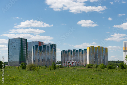 view of the residential complex from a clear field