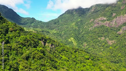 Tropical mountain range and mountain slopes with rainforest. Sri Lanka. Riverston, Sri Lanka. photo