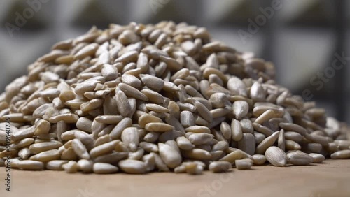 Rotation of sunflower seeds. Peeled sunflower seeds, close-up video.