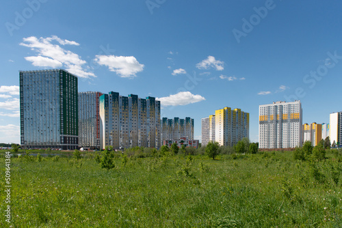 view of the residential complex from a clear field