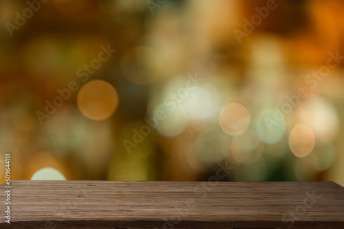 wooden table and Abstract bokeh background.