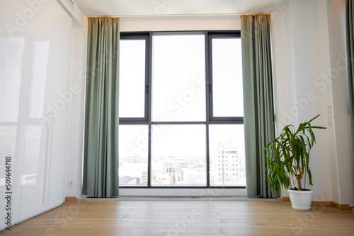 Fototapeta Naklejka Na Ścianę i Meble -  spacious panoramic window in the apartment