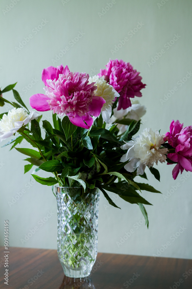 bouquet of flowers in vase. bouquet of white and pink peonies in a vase. bouquet of flowers in vase. bouquet of white and pink peonies in a vase.