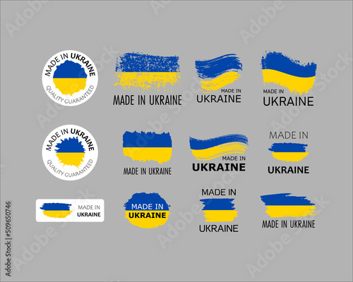 Set of stickers. Made in Ukraine. Brush strokes shaped with Ukrainian flag. Factory, manufacturing and production country concept. Design element for label and packaging. Vector colorful illustration. photo