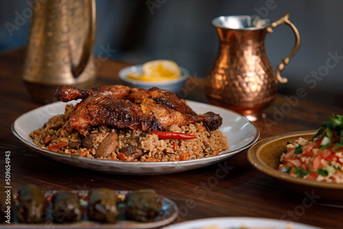 Kabsa close-up, rice and meat dish, saudi arabia national traditional food. Muslim family dinner, Ramadan, iftar. Arabian cuisine. Religious holiday, holy month.