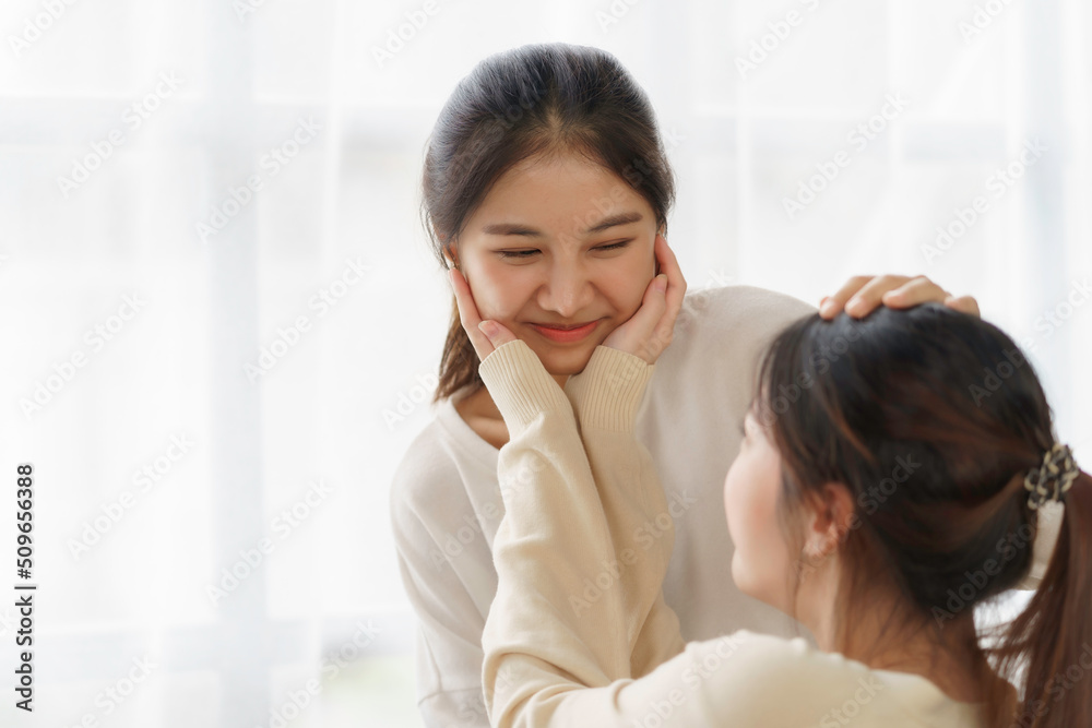 Asian lesbian couple, LGBTQ. Happy Two young Asia women showing love and romance together at home. Positive mood and moment of LGBT lesbian. Asian lesbian couple, LGBTQ. Happy Two young Asia women showing love and romance together at home. Positive mood and moment of LGBT lesbian.