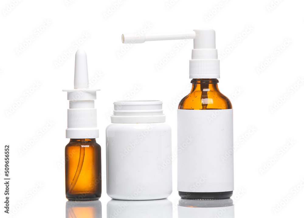 Fototapeta premium Bottles of medicines isolated on white background with reflection