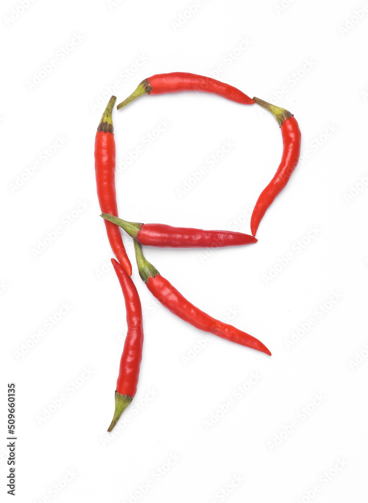 Letter R made from red chilli peppers isolated on white background Letter R made from red chilli peppers isolated on white background